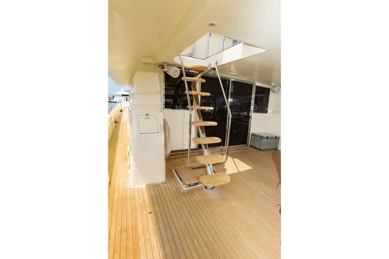 Alegre Yacht Photos Pics Staircase on 2004 Symbol M.S Super 88 Motoryacht with wooden deck and modern design.