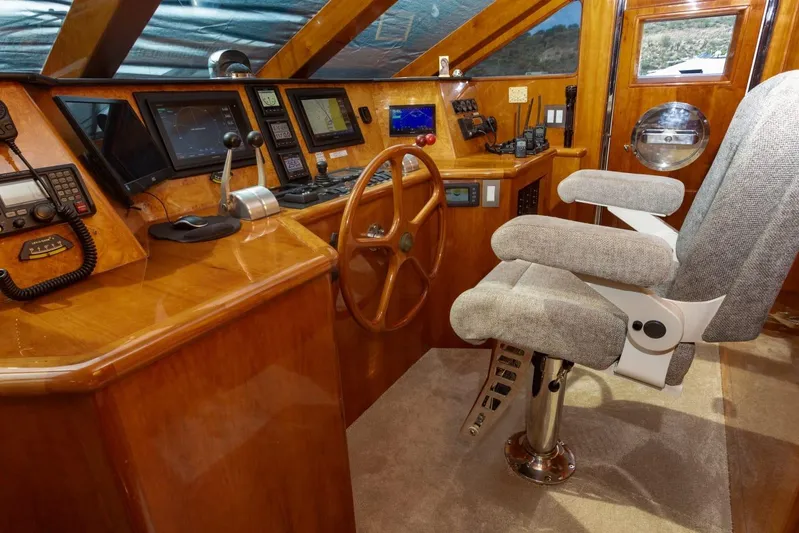 Alegre Yacht Photos Pics Luxurious helm of 2004 Symbol M.S Super 88 Motoryacht with advanced navigation equipment.