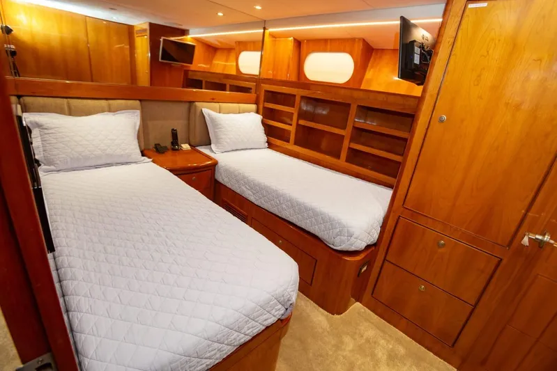 Alegre Yacht Photos Pics Luxurious twin cabin on 2004 Symbol M.S Super 88 Motoryacht with wooden interior.