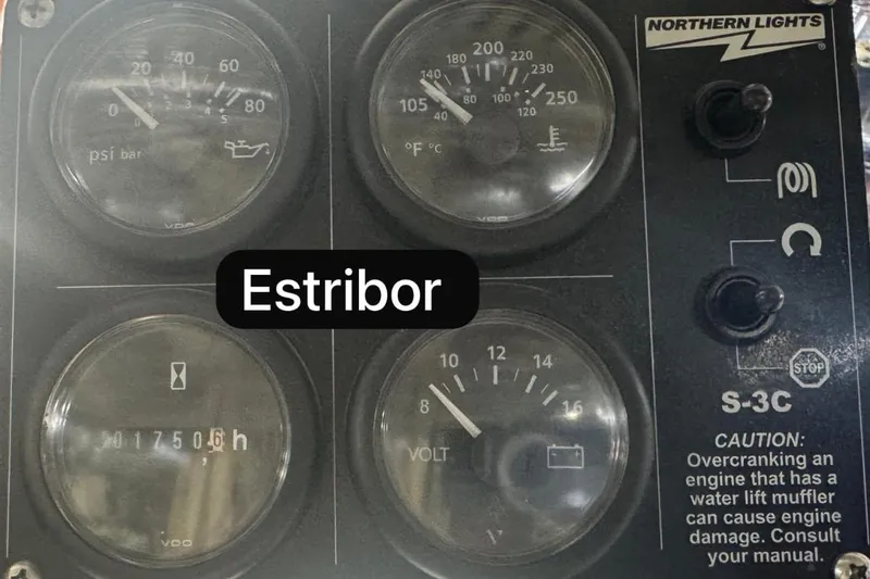 Alegre Yacht Photos Pics Control panel of a 2004 Symbol M.S Super 88 Motoryacht with gauges and caution label.