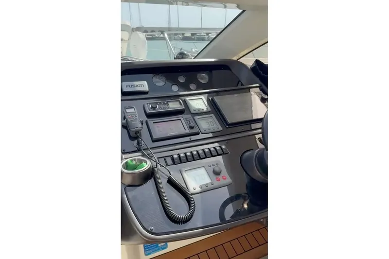  Yacht Photos Pics Control panel of 2010 Sunseeker Portofino 48 yacht with navigation instruments.