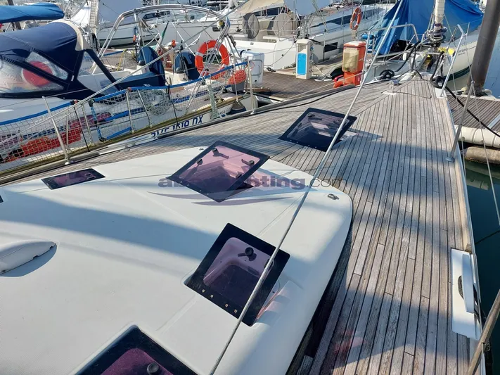  Yacht Photos Pics Deck view of 2011 Beneteau Sense 50 yacht docked at marina.