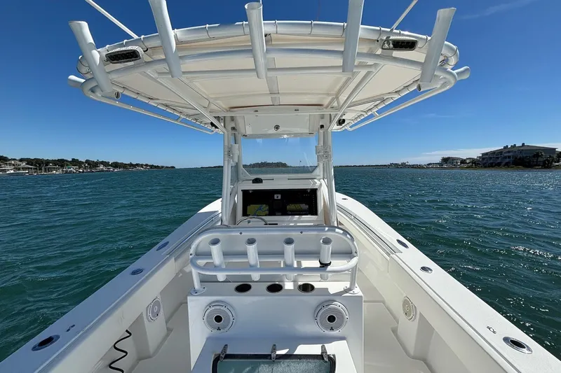  Yacht Photos Pics 2016 Onslow Bay 27 XS boat on water, clear sky, coastal view.