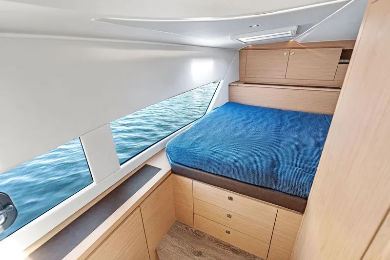  Yacht Photos Pics Luxurious cabin interior of 2025 Makai M37 yacht with ocean view.