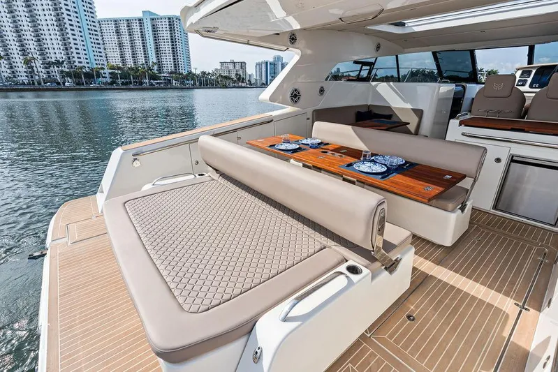  Yacht Photos Pics Luxury Makai M37 yacht interior with elegant seating and dining area, 2025 model.