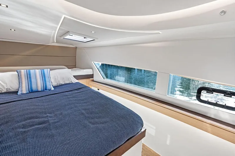  Yacht Photos Pics Luxurious cabin interior of 2025 Makai M37 yacht with modern design and large windows.
