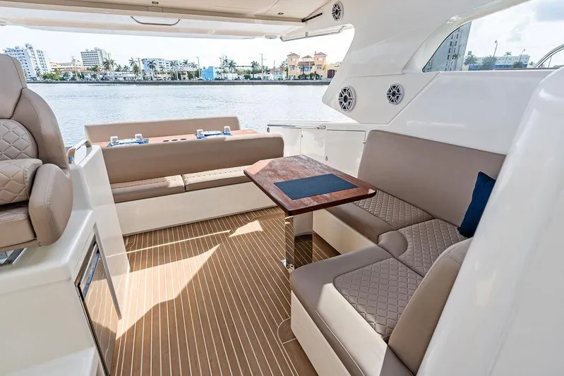  Yacht Photos Pics Luxurious interior of 2025 Makai M37 yacht with elegant seating and waterfront view.