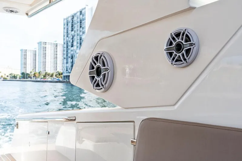  Yacht Photos Pics Luxury Makai M37 boat interior with speakers, cityscape view, 2025 model.