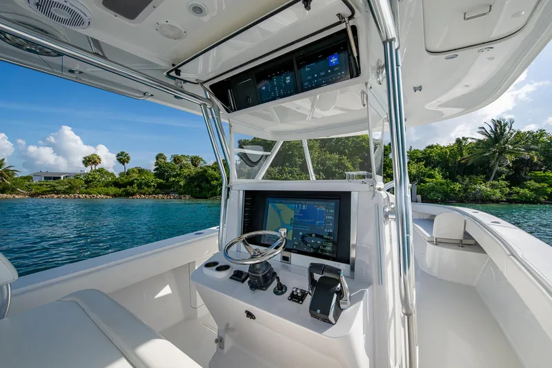 Irish Exit Yacht Photos Pics Interior view of 2016 Bahama boat with Mercury V10 engines, featuring advanced navigation system.