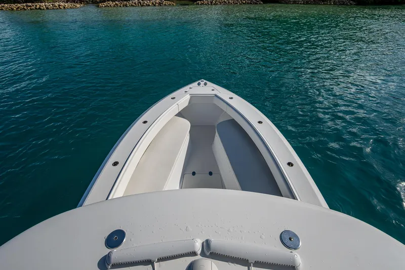 Irish Exit Yacht Photos Pics 2016 Bahama boat with Mercury V10 engines on clear blue water.