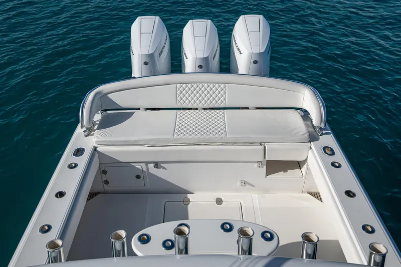 Irish Exit Yacht Photos Pics 2016 Bahama boat with Mercury V10 engines, featuring spacious seating and rod holders.