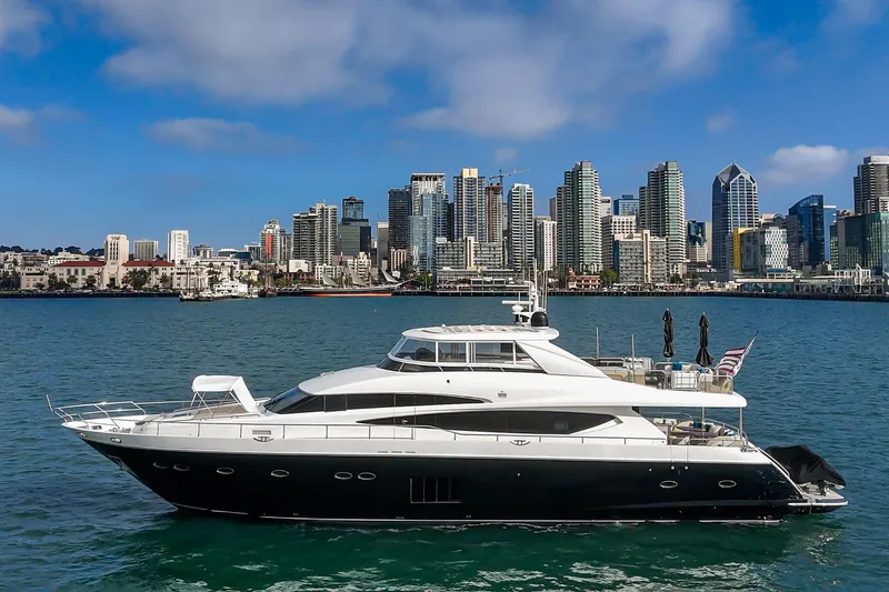 Sweeter T Yacht Photos Pics Luxury 2011 Princess 95 Motor Yacht cruising near city skyline.