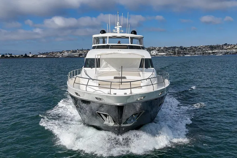 Sweeter T Yacht Photos Pics Luxurious 2011 Princess 95 Motor Yacht cruising on open water.