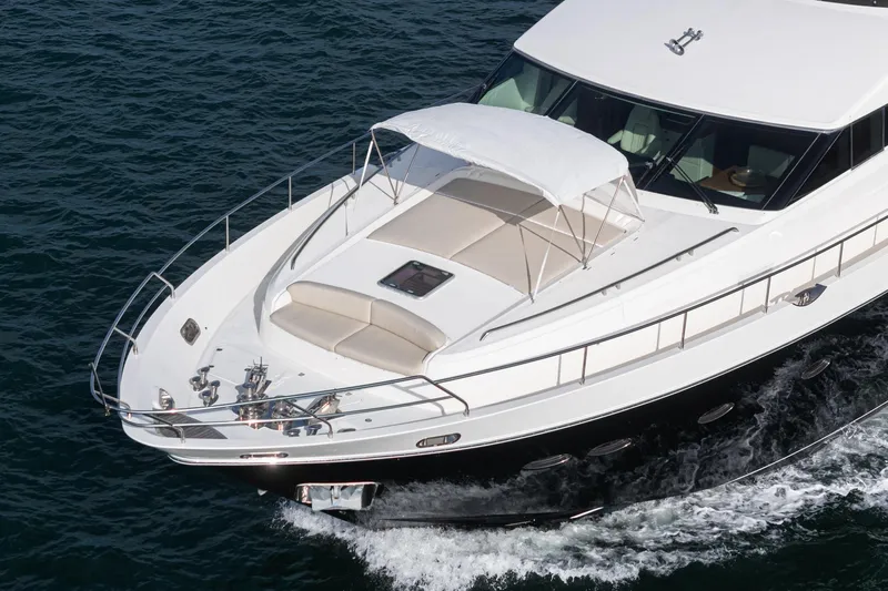 Sweeter T Yacht Photos Pics Luxurious 2011 Princess 95 Motor Yacht cruising on open water.