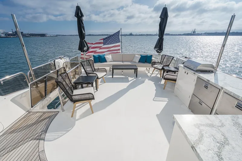 Sweeter T Yacht Photos Pics Spacious deck of 2011 Princess 95 Motor Yacht with seating and ocean view.