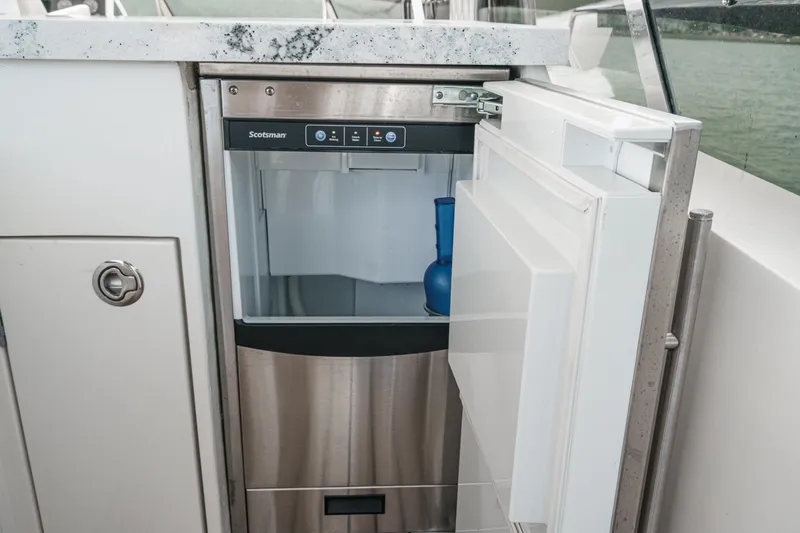 Sweeter T Yacht Photos Pics Open Scotsman ice maker on 2011 Princess 95 Motor Yacht, showcasing modern amenities.