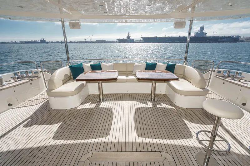 Sweeter T Yacht Photos Pics Luxurious 2011 Princess 95 Motor Yacht deck with elegant seating and ocean view.
