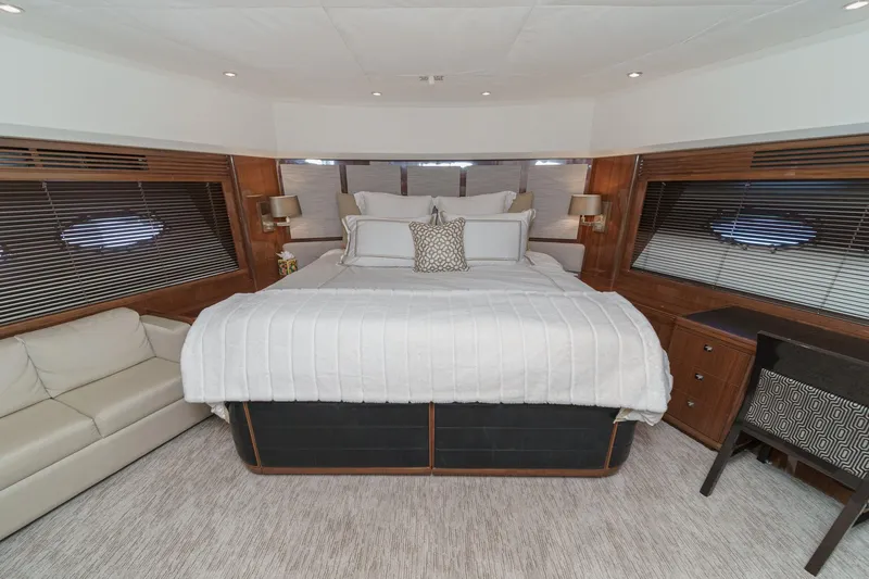 Sweeter T Yacht Photos Pics Luxurious bedroom interior of 2011 Princess 95 Motor Yacht with elegant furnishings.