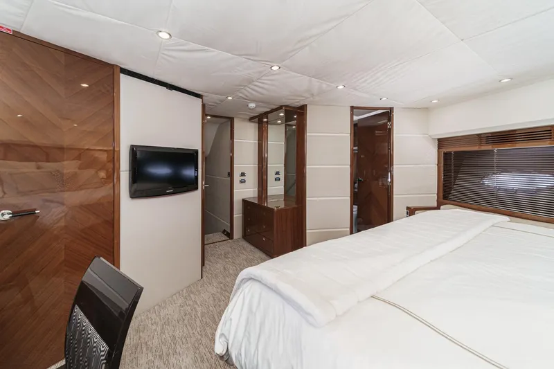 Sweeter T Yacht Photos Pics Luxurious bedroom interior of 2011 Princess 95 Motor Yacht with modern decor and amenities.