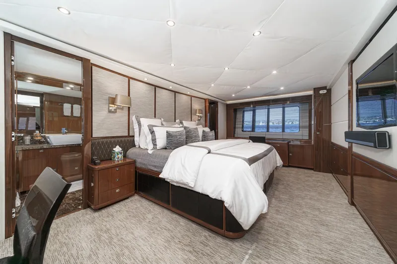 Sweeter T Yacht Photos Pics Luxurious bedroom interior of 2011 Princess 95 Motor Yacht with elegant furnishings.