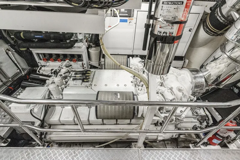 Sweeter T Yacht Photos Pics Engine room of a 2011 Princess 95 Motor Yacht, showcasing machinery and equipment.