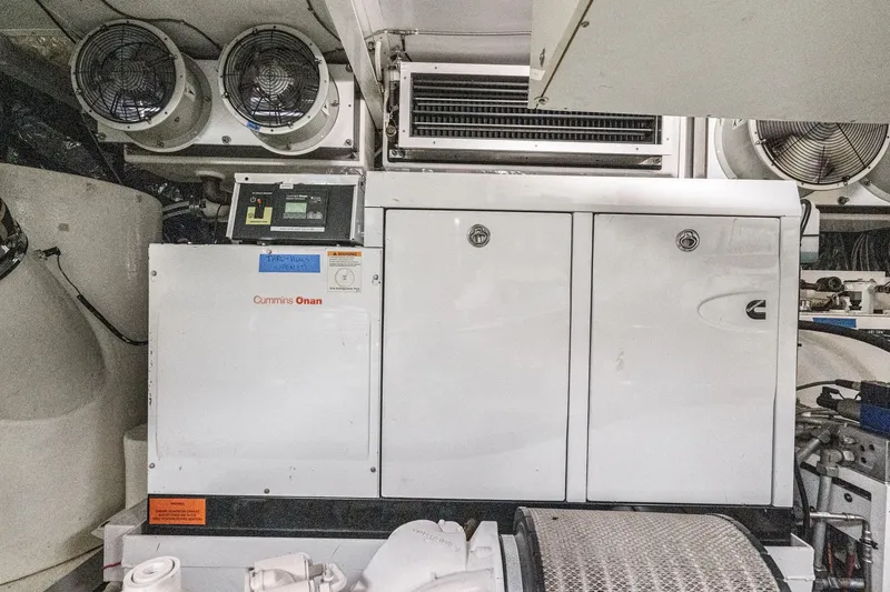 Sweeter T Yacht Photos Pics Engine room of 2011 Princess 95 Motor Yacht with Cummins Onan generator.