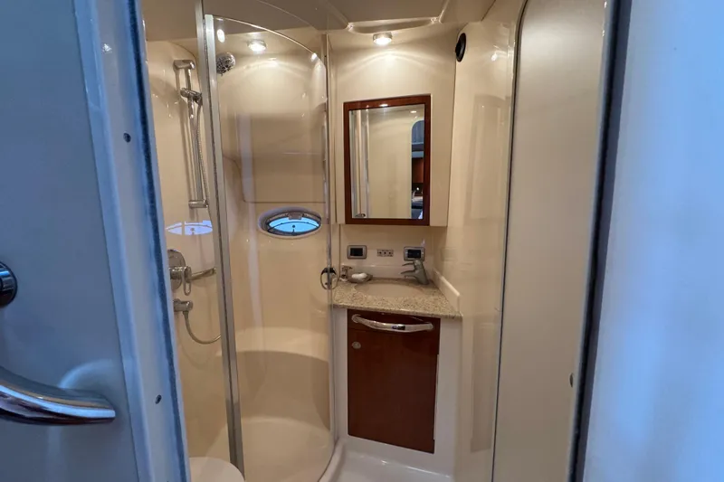Marlys Kay Yacht Photos Pics Bathroom interior of 2004 Sea Ray 390 Motor Yacht with shower and vanity.
