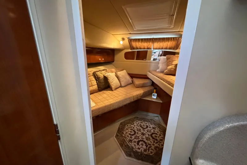 Marlys Kay Yacht Photos Pics Interior of 2004 Sea Ray 390 Motor Yacht with cozy seating and elegant decor.