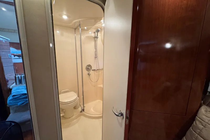 Marlys Kay Yacht Photos Pics 2004 Sea Ray 390 Motor Yacht bathroom with shower and toilet.
