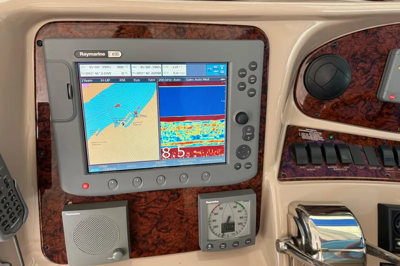 Marlys Kay Yacht Photos Pics Raymarine C120 navigation system on 2004 Sea Ray 390 Motor Yacht dashboard.