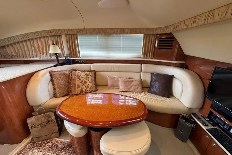 Marlys Kay Yacht Photos Pics Luxurious interior of 2004 Sea Ray 390 Motor Yacht with elegant seating and decor.