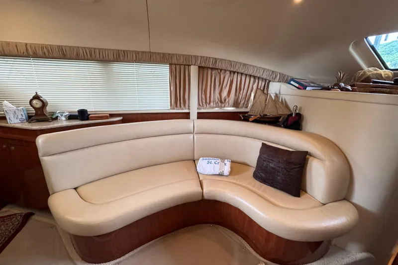 Marlys Kay Yacht Photos Pics Luxurious interior of 2004 Sea Ray 390 Motor Yacht with curved leather seating.