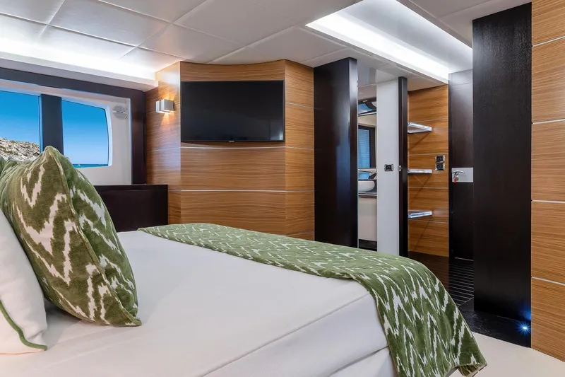  Yacht Photos Pics Luxurious bedroom interior of 2008 Astondoa 76 GLX yacht with modern decor and ocean view.