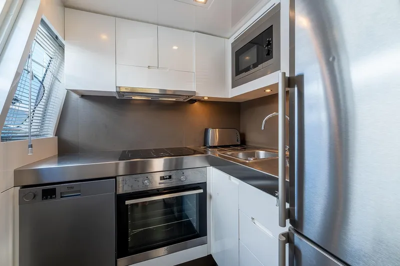  Yacht Photos Pics Modern kitchen in 2008 Astondoa 76 GLX yacht with stainless steel appliances.