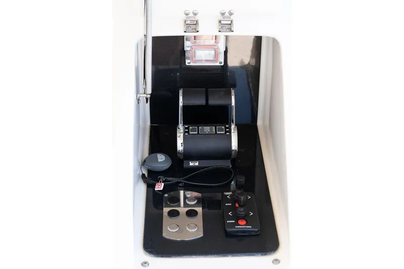  Yacht Photos Pics Control panel of a 2008 Astondoa 76 GLX yacht, featuring throttle and joystick controls.