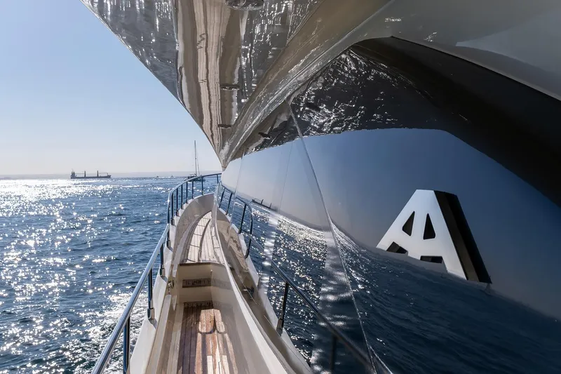  Yacht Photos Pics Luxurious 2008 Astondoa 76 GLX yacht reflecting sunlight on the ocean.