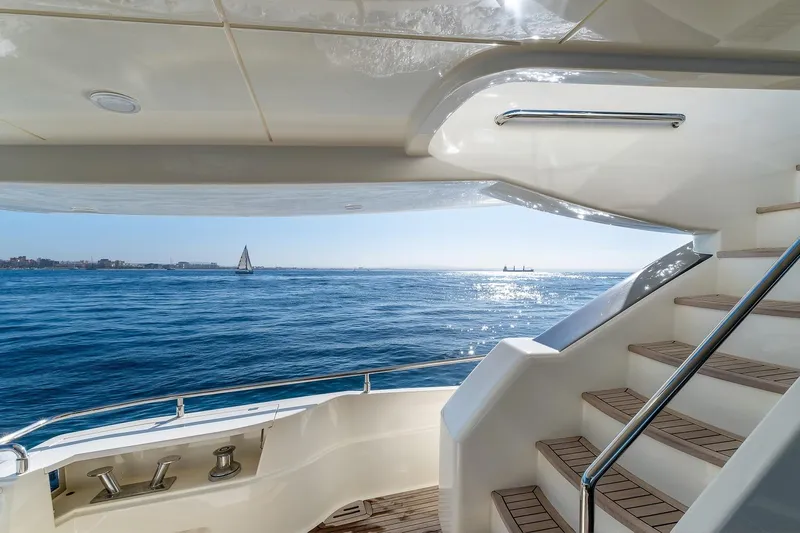  Yacht Photos Pics Luxurious 2008 Astondoa 76 GLX yacht deck with ocean view and elegant staircase.