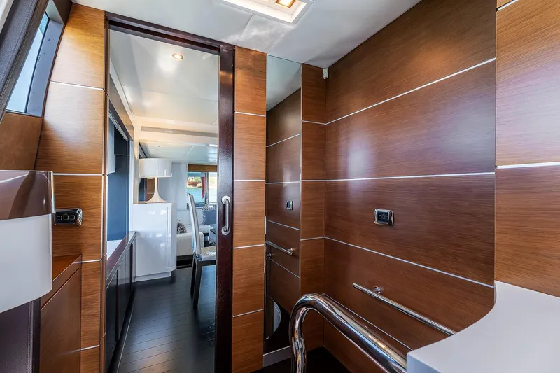  Yacht Photos Pics Luxurious interior of 2008 Astondoa 76 GLX yacht with sleek wood paneling and modern design.