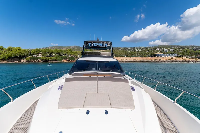  Yacht Photos Pics Astondoa 76 GLX 2008 yacht cruising on clear blue waters under a sunny sky.