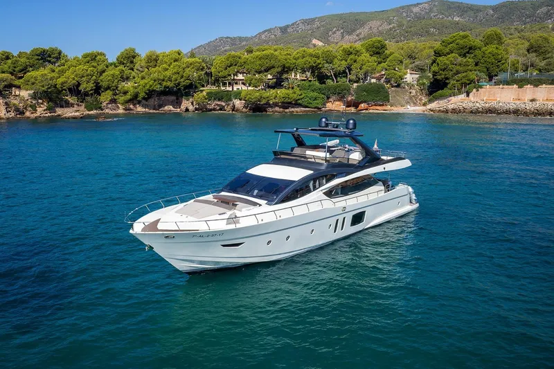  Yacht Photos Pics Luxury 2008 Astondoa 76 GLX yacht cruising in scenic coastal waters.