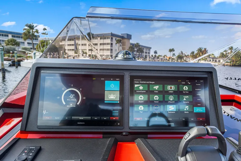  Yacht Photos Pics Dashboard of 2021 Wally 48 yacht with advanced navigation displays in marina setting.