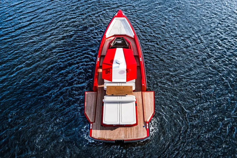  Yacht Photos Pics Red 2021 Wally 48 yacht on blue water, aerial view.