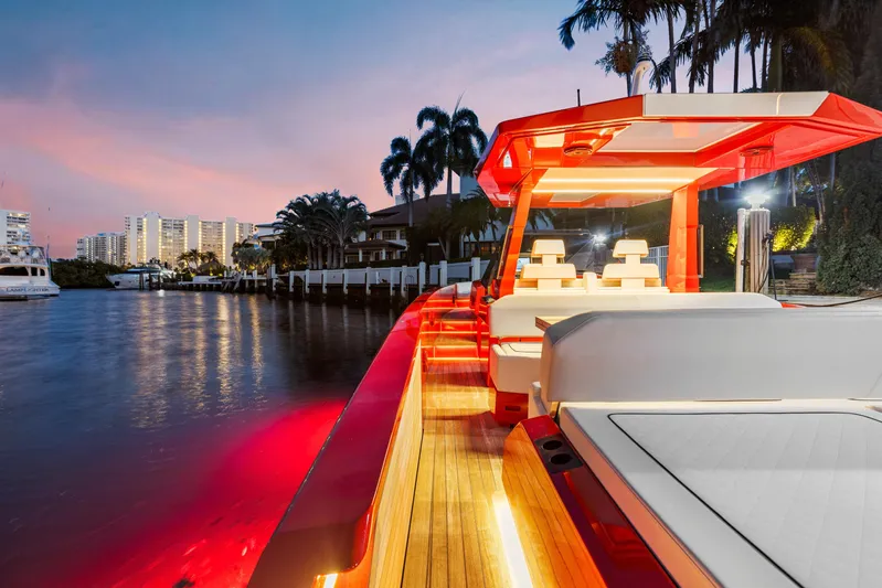  Yacht Photos Pics Luxury Wally 48 yacht at sunset, featuring sleek design and ambient lighting, 2021 model.