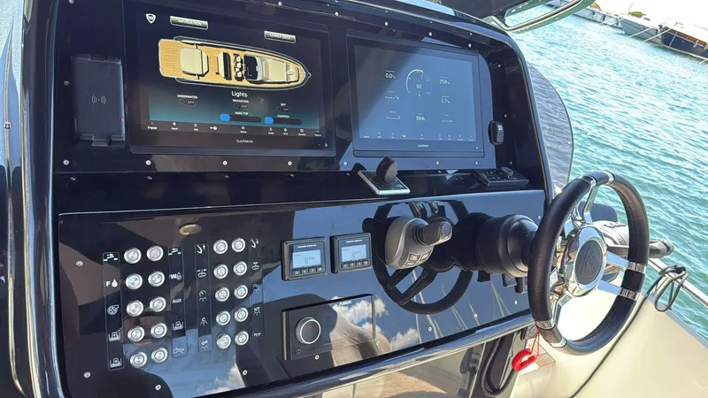  Yacht Photos Pics 2024 SACS Rebel 47 helm with advanced navigation and control systems.