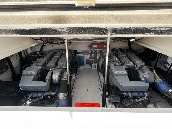 Christine Elizabeth Yacht Photos Pics Engine room of 2002 Rampage 38 Express boat with dual Yanmar engines.
