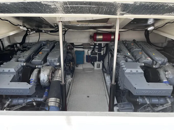Christine Elizabeth Yacht Photos Pics Engine room of 2002 Rampage 38 Express with dual Yanmar engines.
