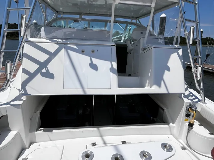 Christine Elizabeth Yacht Photos Pics 2002 Rampage 38 Express boat with open cockpit and helm station.