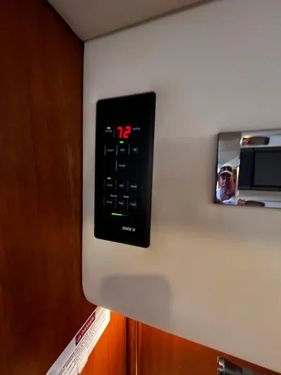Christine Elizabeth Yacht Photos Pics Thermostat control panel inside 2002 Rampage 38 Express boat cabin.
