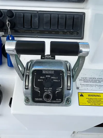 Christine Elizabeth Yacht Photos Pics Throttle controls on a 2002 Rampage 38 Express yacht dashboard.