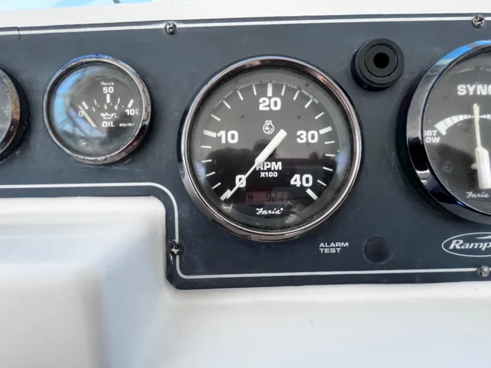 Christine Elizabeth Yacht Photos Pics Close-up of 2002 Rampage 38 Express boat dashboard gauges, including RPM and oil pressure.